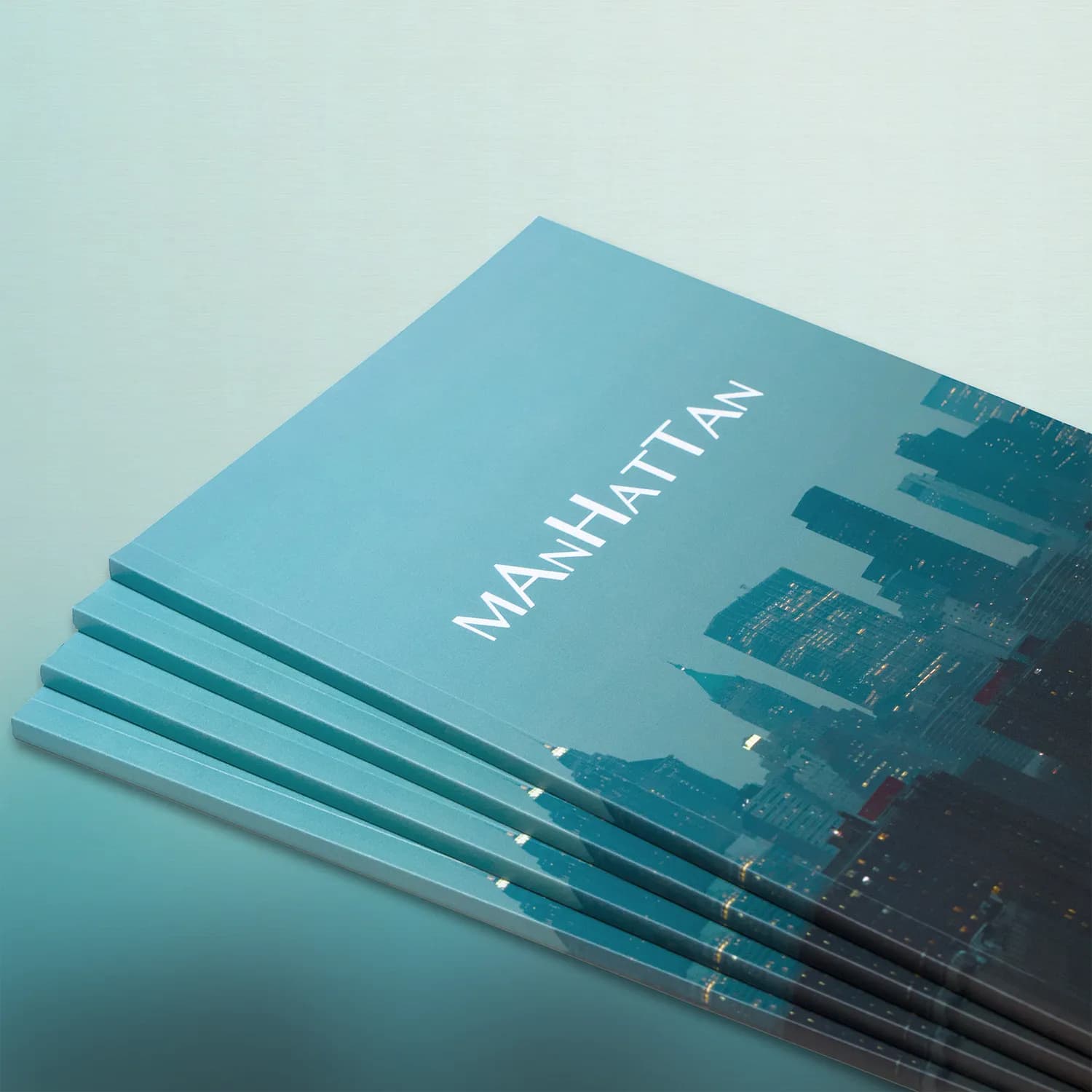 A fanned stack of Manhattan Volume 1 covers