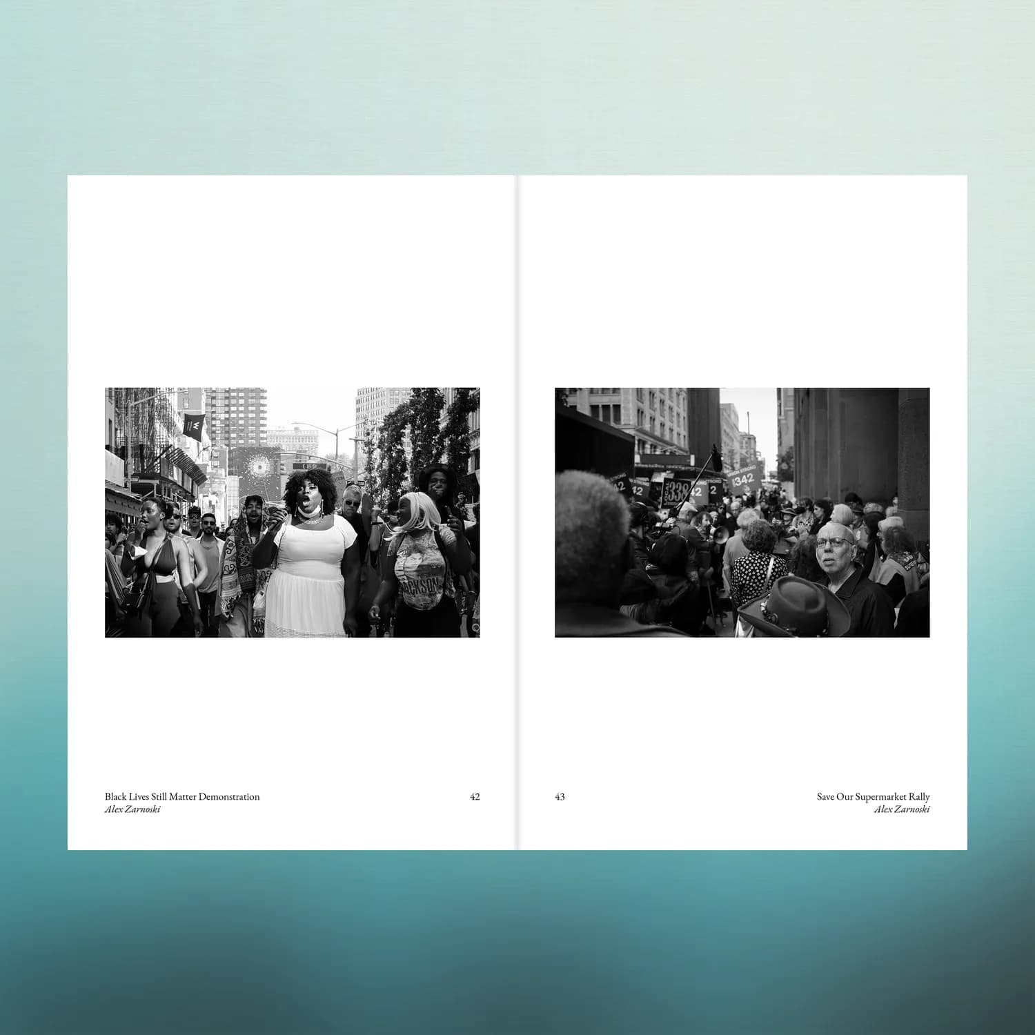 Spread: two black and white photos of street demonstrations